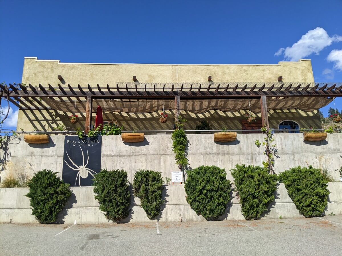 Looking towards Black Widow Winery tasting room, with Mediterranean style architecture 