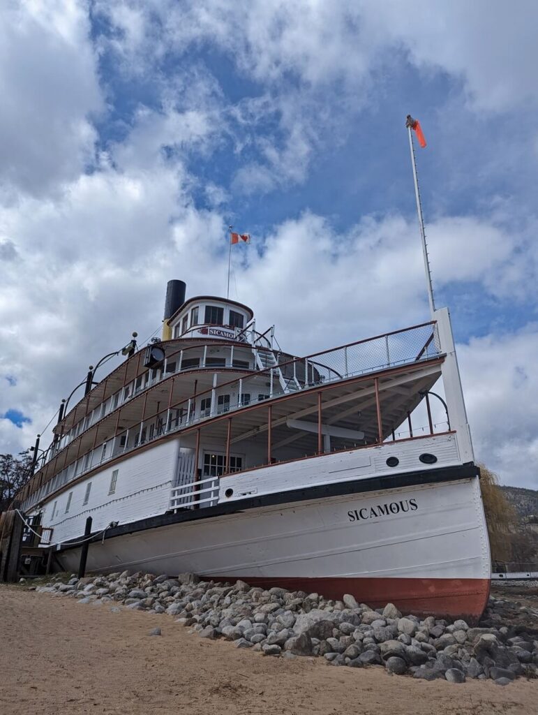 Looking up at the historic SS Sicamous Sternwheeler from Okanagan Lake beach