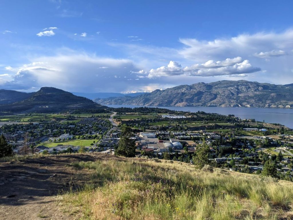 Panoramic view of lake, mountain and the city of Summerland from Giant's Head Mountain Trail