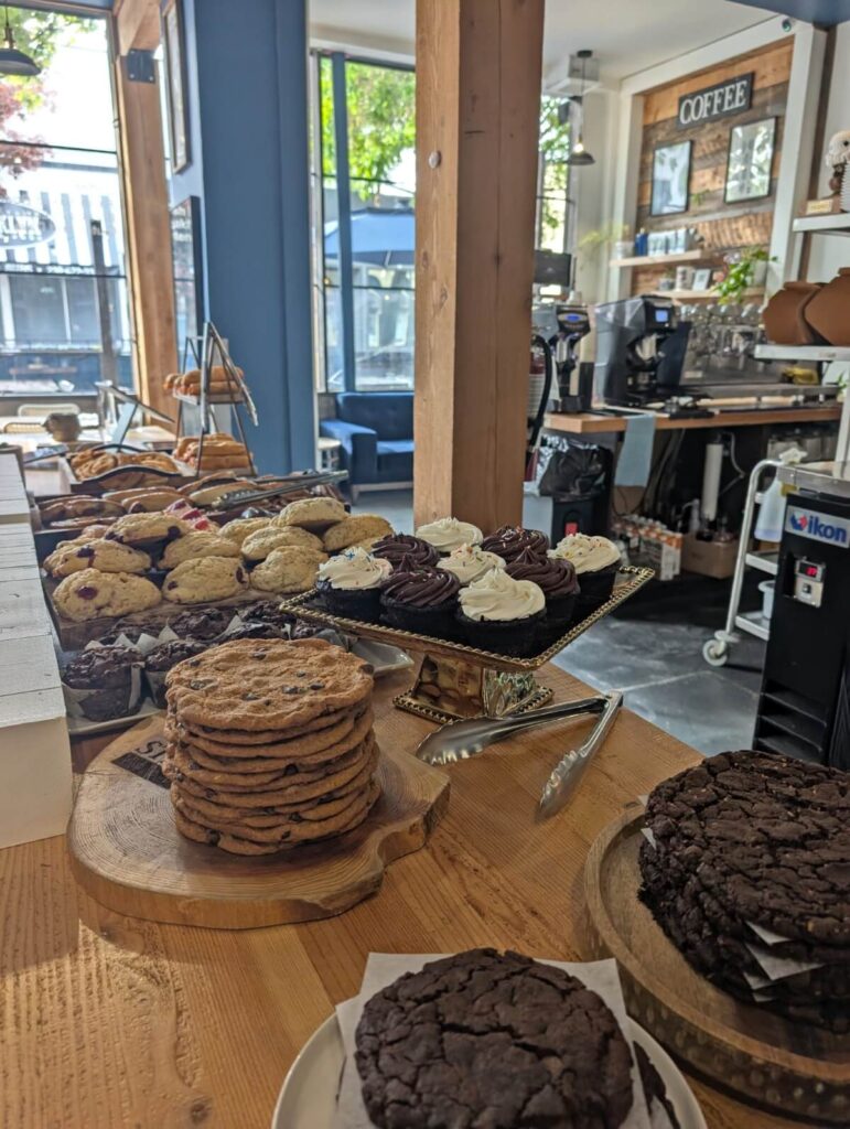 Close up of cookies, cupcakes, scones and other baked goods on the counter at Stillfood Bistro in Penticton